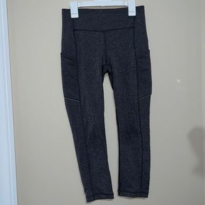 Lululemon Size 4 Women’s grey reflective cropped leggings with side pockets 25”